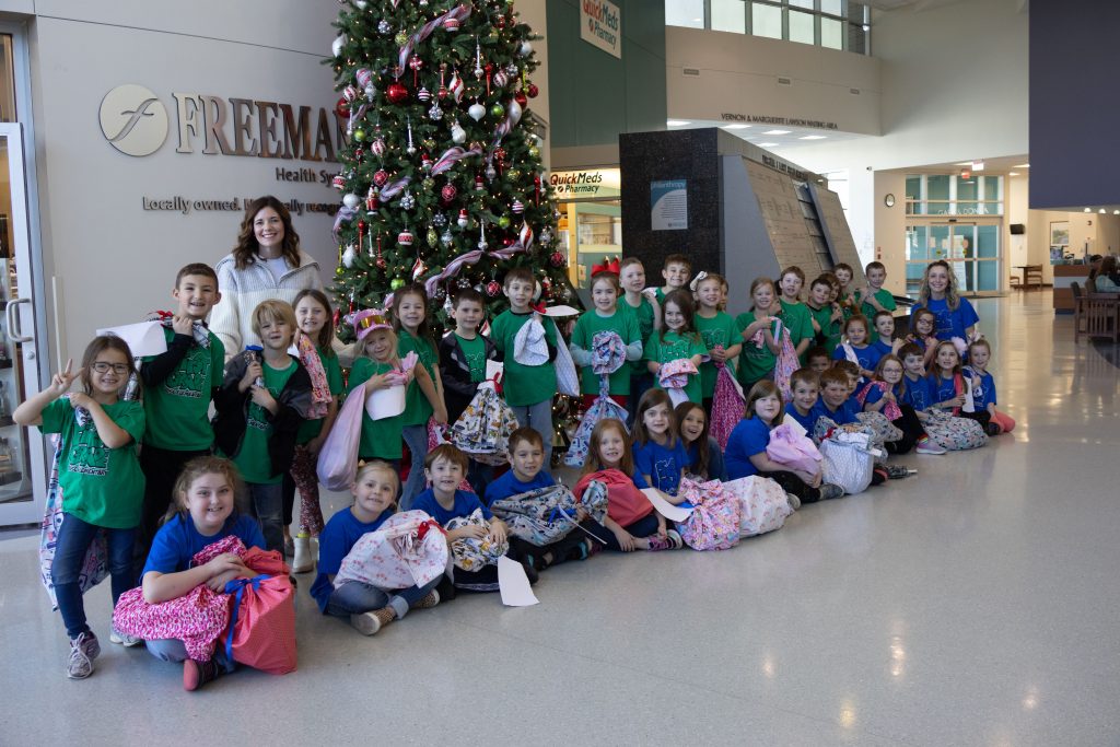 Neosho Elementary Students Deliver Pillowcases Full of Toys to Freeman Hospital West's Sick Children