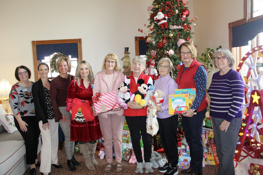 Freeman Health System Auxiliary Volunteers Donate Gifts to Ronald McDonald House Charities of the Four States